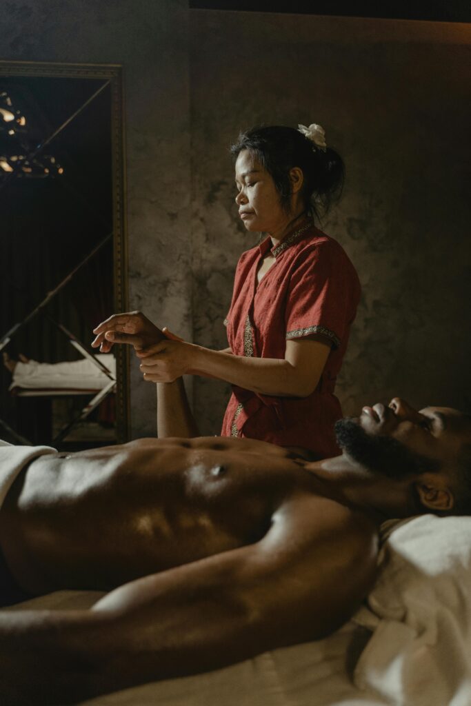 A serene spa session with a professional masseuse providing relaxation therapy.